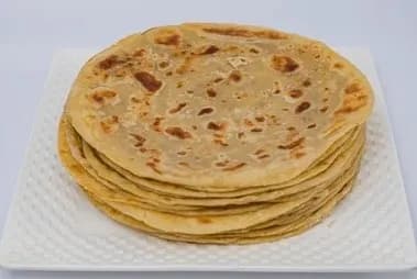 Chapati: Soft, flaky, hand-rolled layered flatbread made fresh.