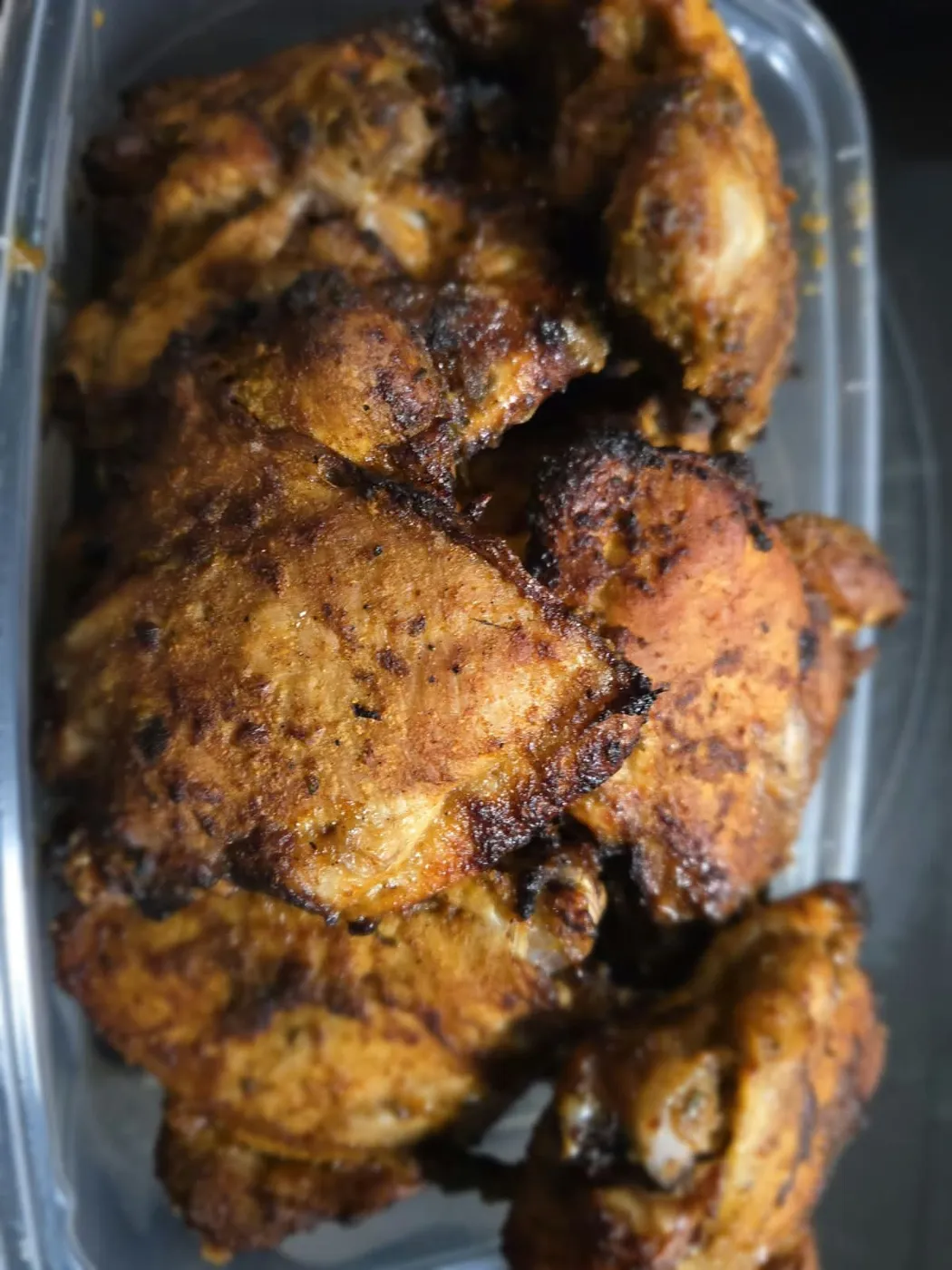 Kuku Choma: Flame-grilled chicken marinated in garlic, ginger and our house spice rub.
